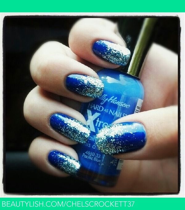 Striking Beauty Cobalt Blue Clothing With Silver Glitter Nails For A Bold Statement