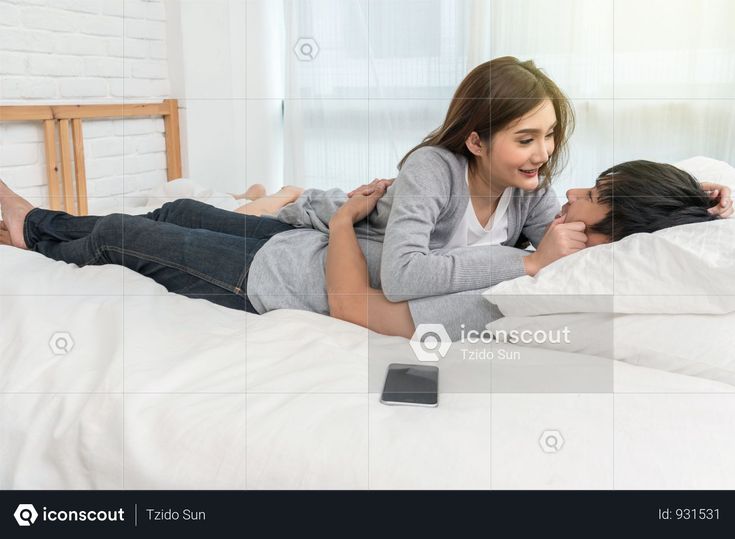 Couple Hug From Back On Bed