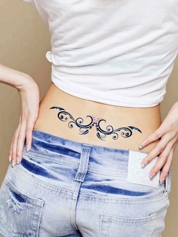 Female Bottom Of Back Tattoos